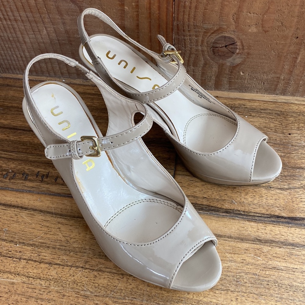 Tan coloured ladies Unisa high heeled shoes in beautiful shape.